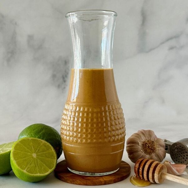 Healthy Thai Peanut Dressing in a jar.