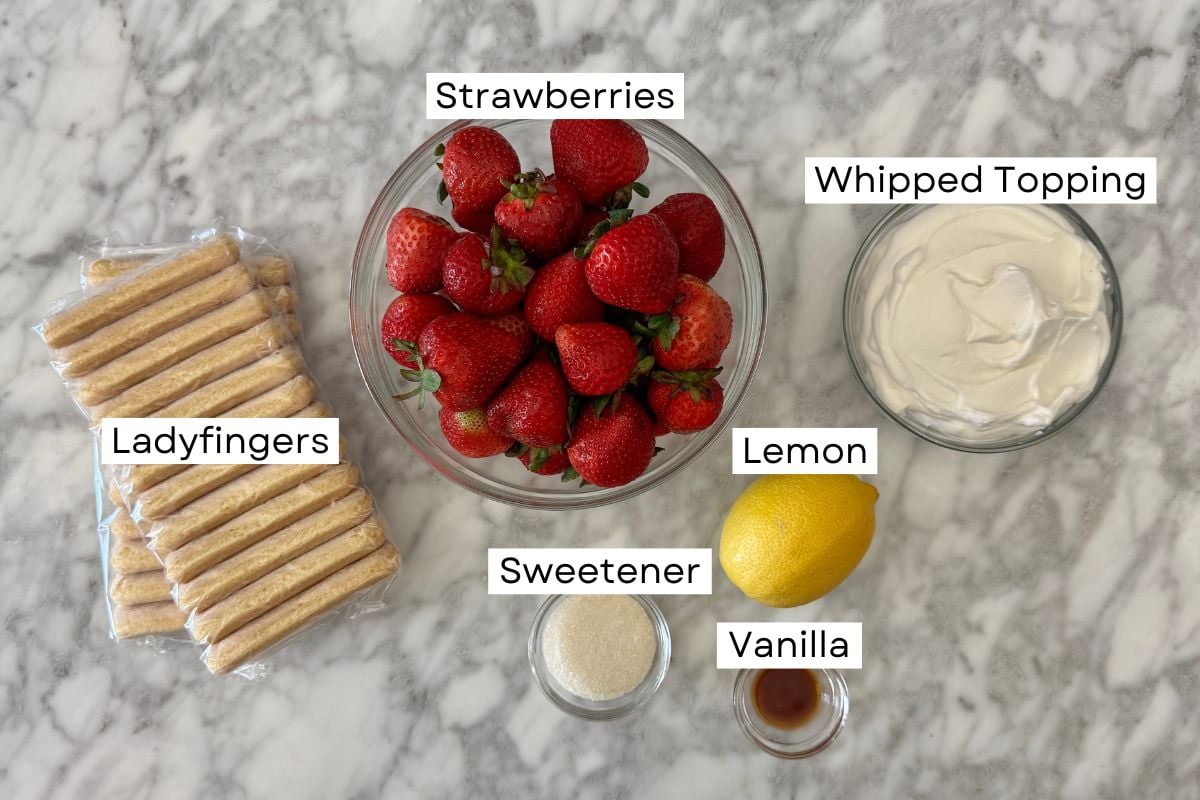 Ingredients for healthy strawberry tiramisu in bowls.