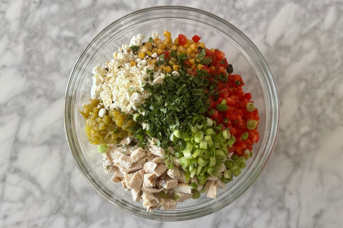 Mexican street corn pasta salad in bowl | Healthy Foodie Girl Mexican street corn pasta salad in bowl.