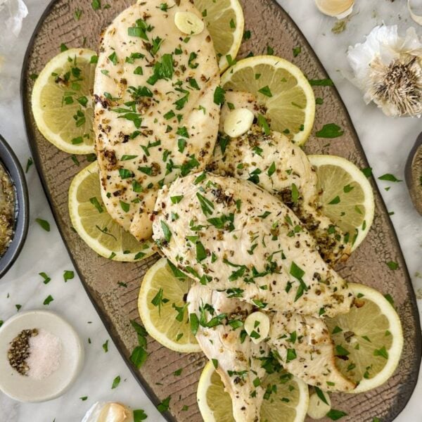 Air Fryer Lemon Garlic Chicken Breast on a serving platter.