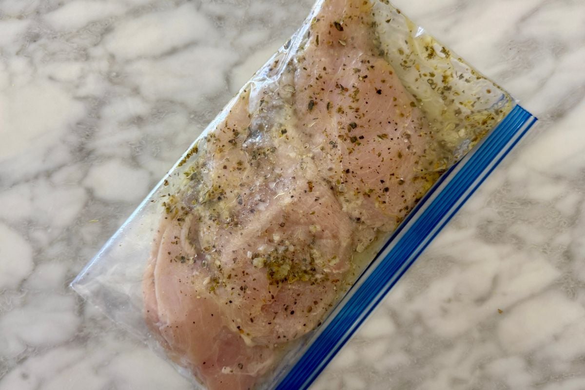 Chicken in bag with marinade.