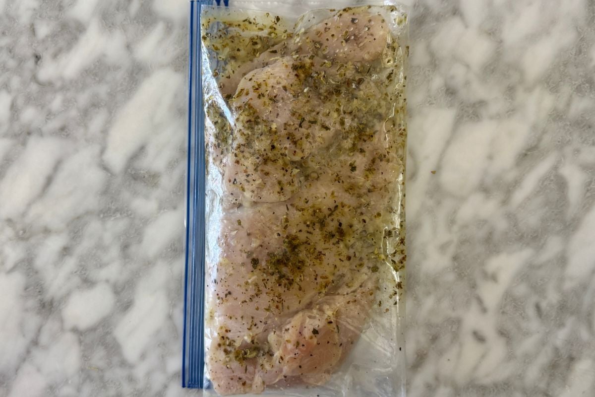 Chicken marinated in bag.
