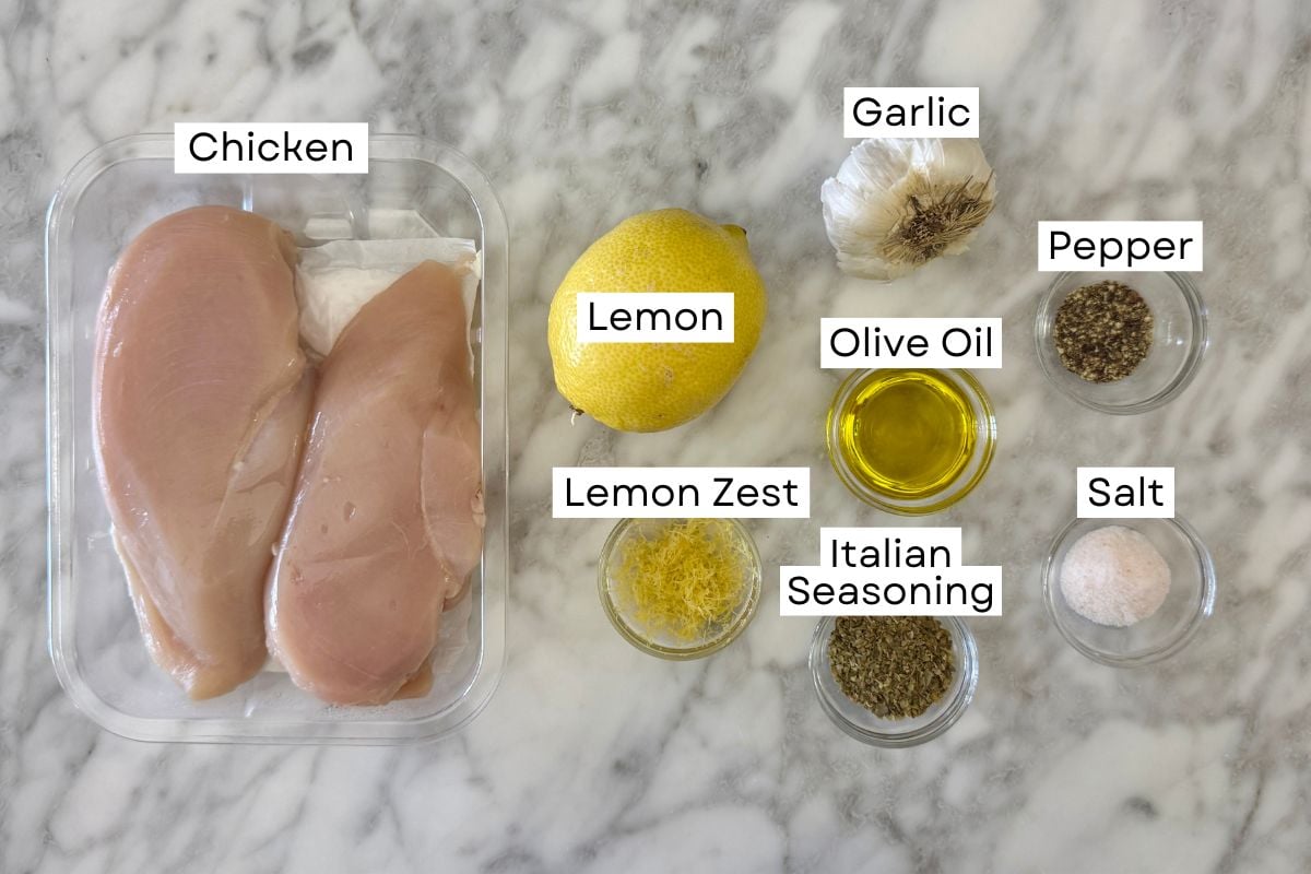 Ingredients for air fryer lemon garlic chicken breast recipe in bowls.