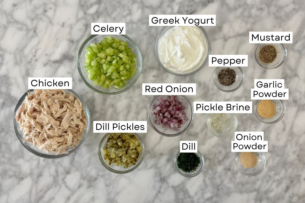 Ingredients for dill pickle chicken salad in bowls.