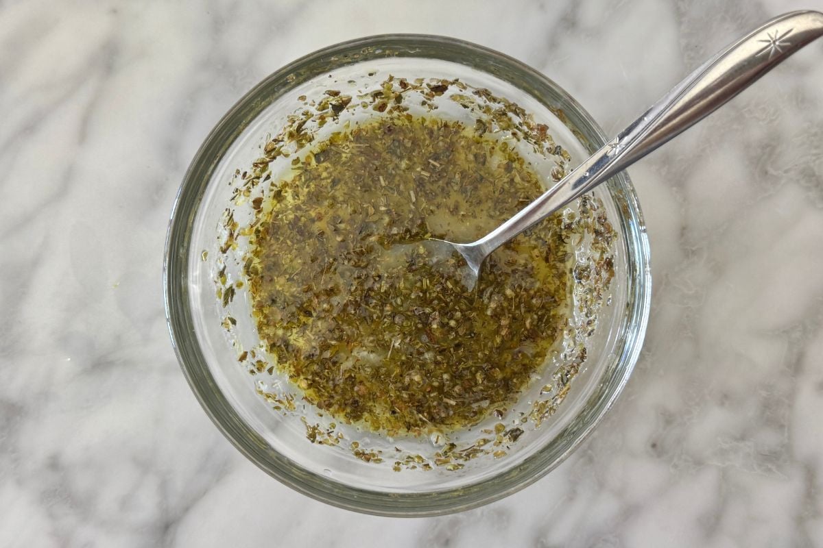 Lemon garlic marinade for air fryer chicken in bowl.