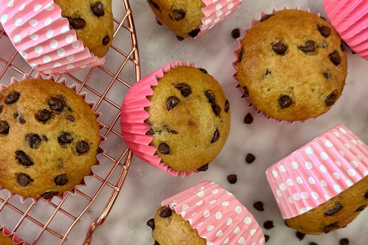Baked chocolate chip muffins on wire rack | Healthy Foodie Girl Baked chocolate chip muffins on wire rack.