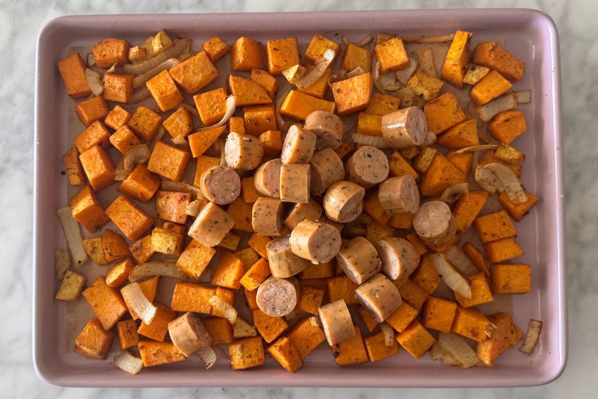 Chicken sausage on sheet pan with sweet potatoes.