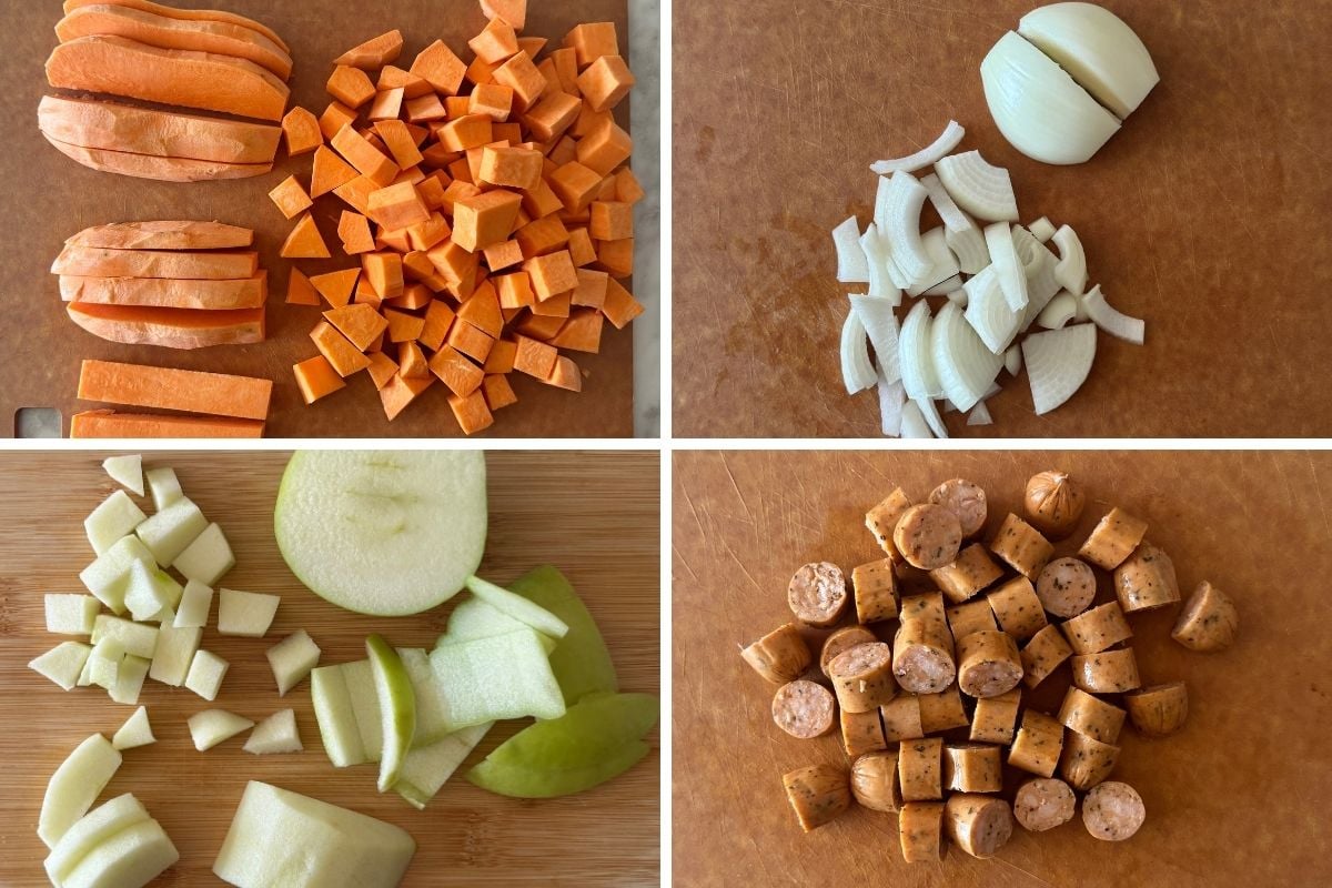 Chopped apples sausage onion and sweet potatoes on cutting board.