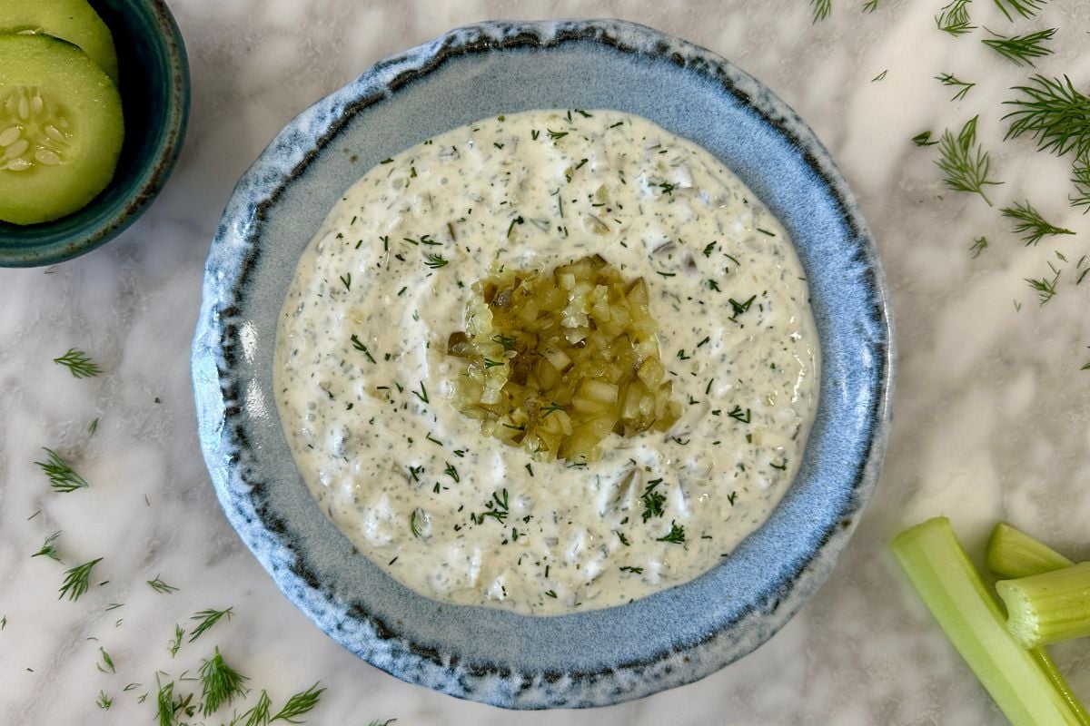 Dip with dill pickles served in a bowl | Healthy Foodie Girl Dip with dill pickles served in a bowl.