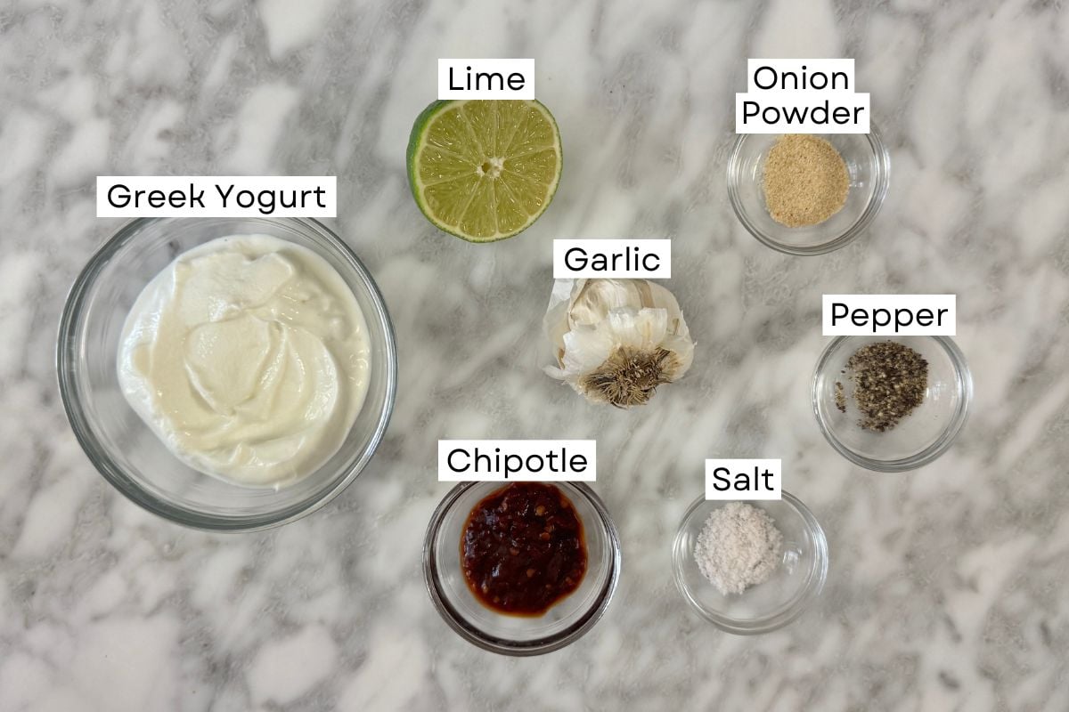 Ingredients for Greek yogurt chipotle aioli in bowls.