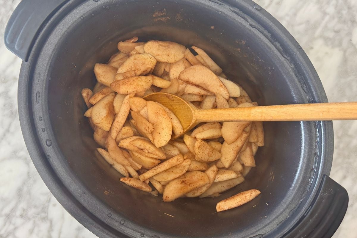 Cooked cinnamon apples in the slow cooker.