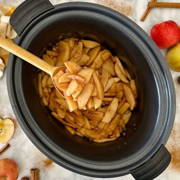 Healthy Slow Cooker Cinnamon Apples in a slow cooker.
