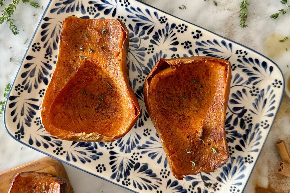 Air fried honeynut squash served on a plate.