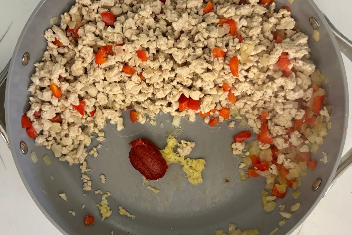 Cooked ground turkey in pan.