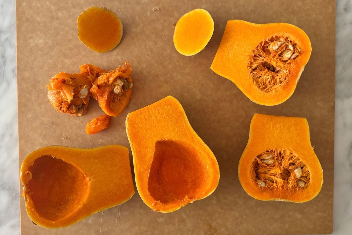 Honeynut squash sliced in half with seeds removed.