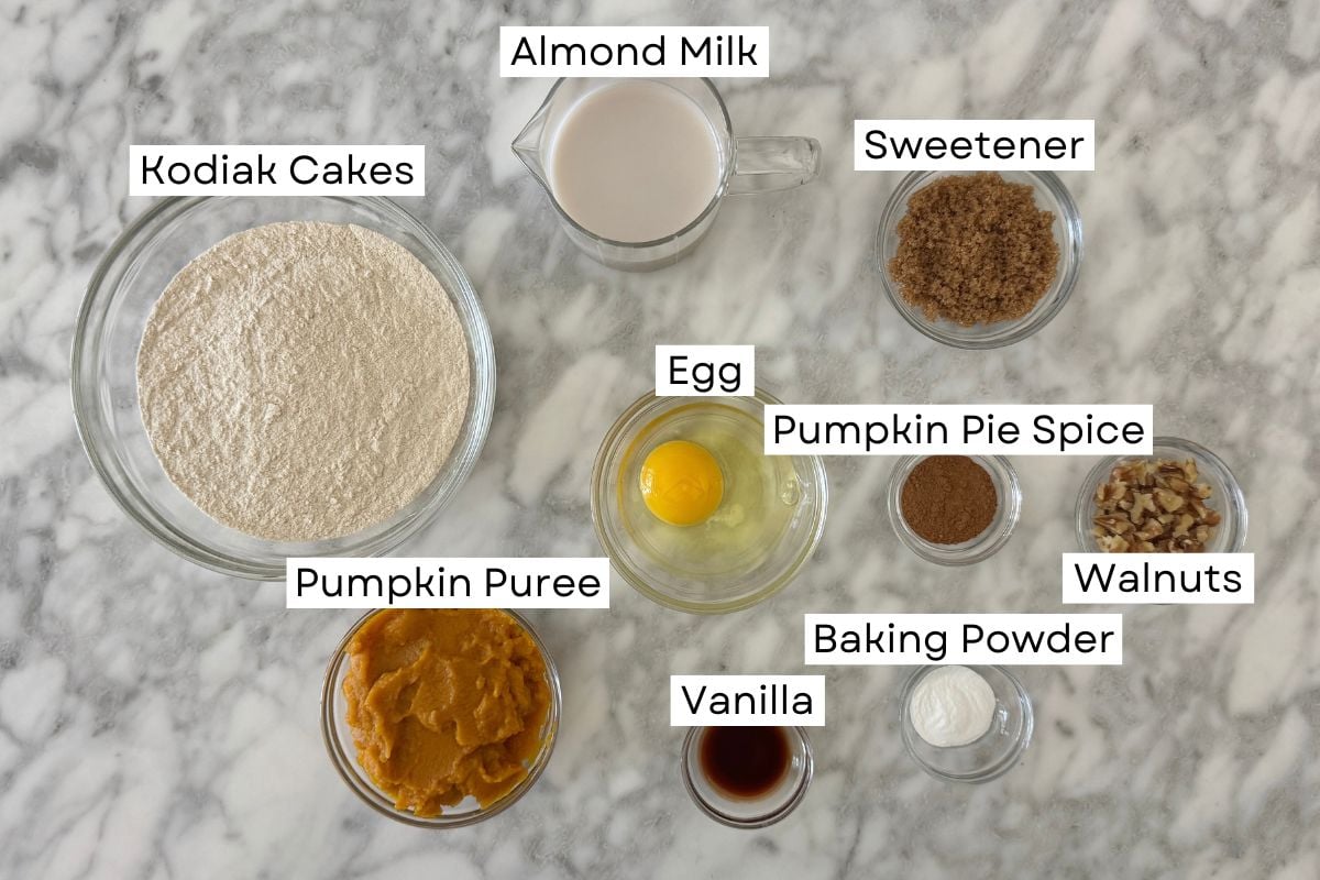 Ingredients for Kodiak sheet pan pumpkin pancakes in bowls | Healthy Foodie Girl Ingredients for Kodiak sheet pan pumpkin pancakes in bowls.