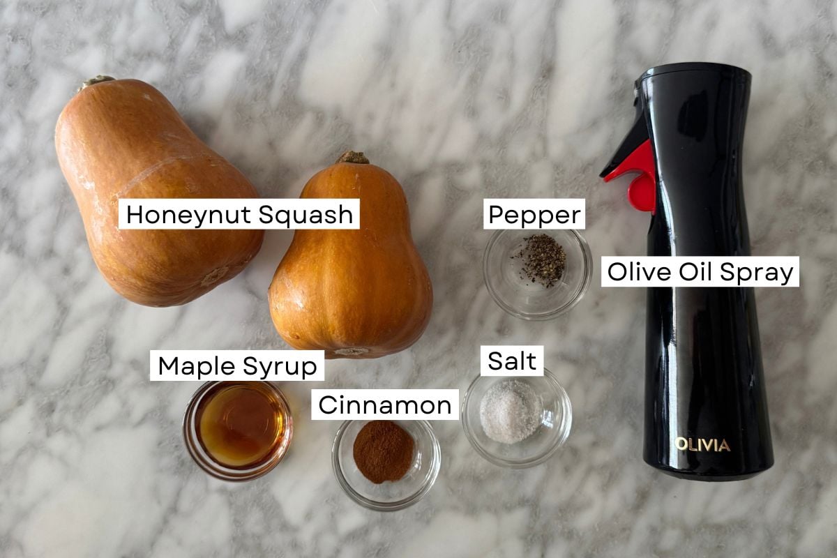 Ingredients for air fryer honeynut squash in bowls.