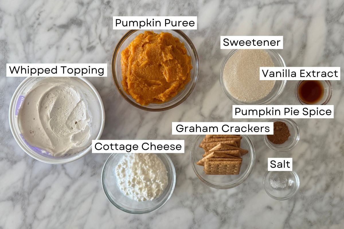 Ingredients for pumpkin icebox cake in bowls.