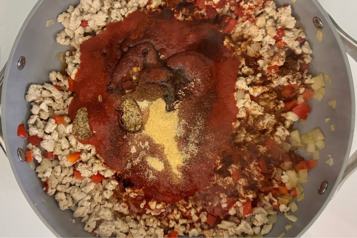 Sauce and spices for sloppy joes in pan.