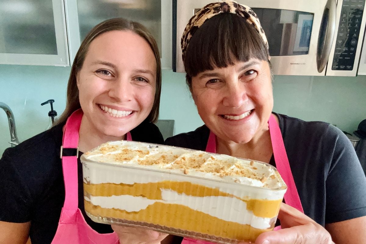 Shawna and Ella holding pumpkin icebox cake.